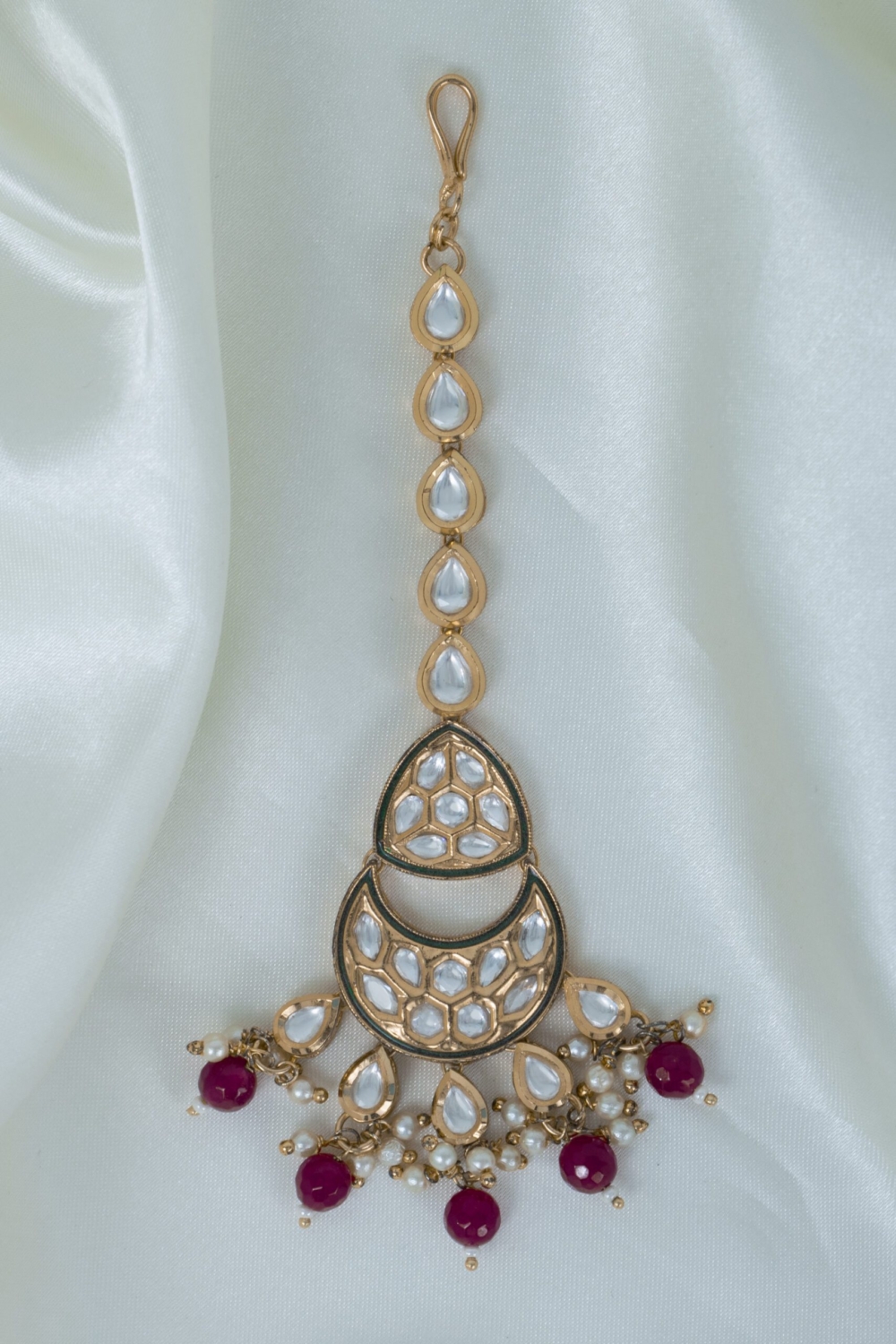 Uncut polki kundan tikka with classy meena touch